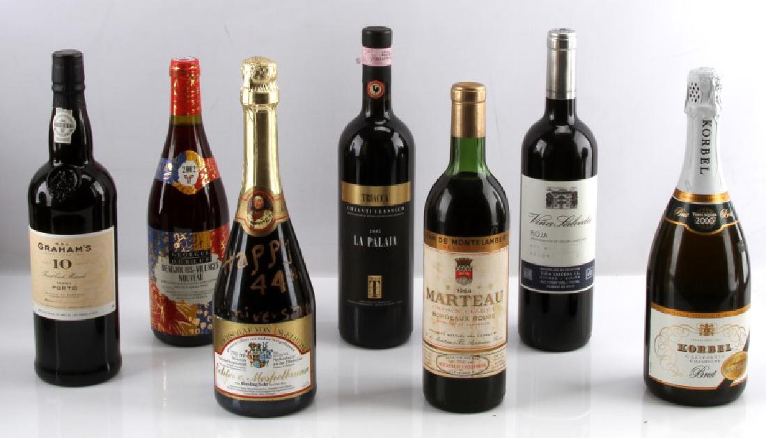 7 BOTTLE LOT OF WINES FROM AROUND THE WORLD: All are new and unopened. Labels are fully intact and bottles have been properly kept. 1st is a RARE bottle of Korbel brut 2000 millennium edition times square. you could only get on new years eve in 