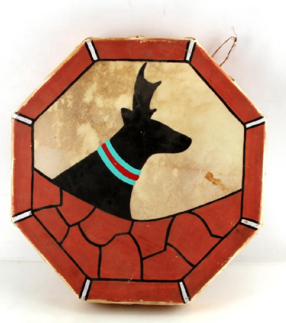 TOM HERRERA NATIVE AMERICAN PUEBLO COCHITI DRUM: Native American artist & tribal leader Tom Herrera Pueblo Cochiti drum with painted image of a Stag on the face of drum in a vibrant red & black color scheme. Tom Herrera is a prolific Native Pueblo a