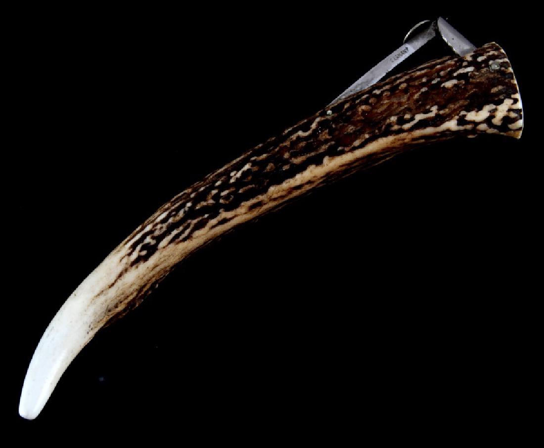 7 INCH J A HENCKELS ANTLER MOUNTED CIGAR CUTTER: German made J.A. Henckels antler mounted cigar/cheroot cutter. Approx. 7" (measured on the curve). Very good condition.