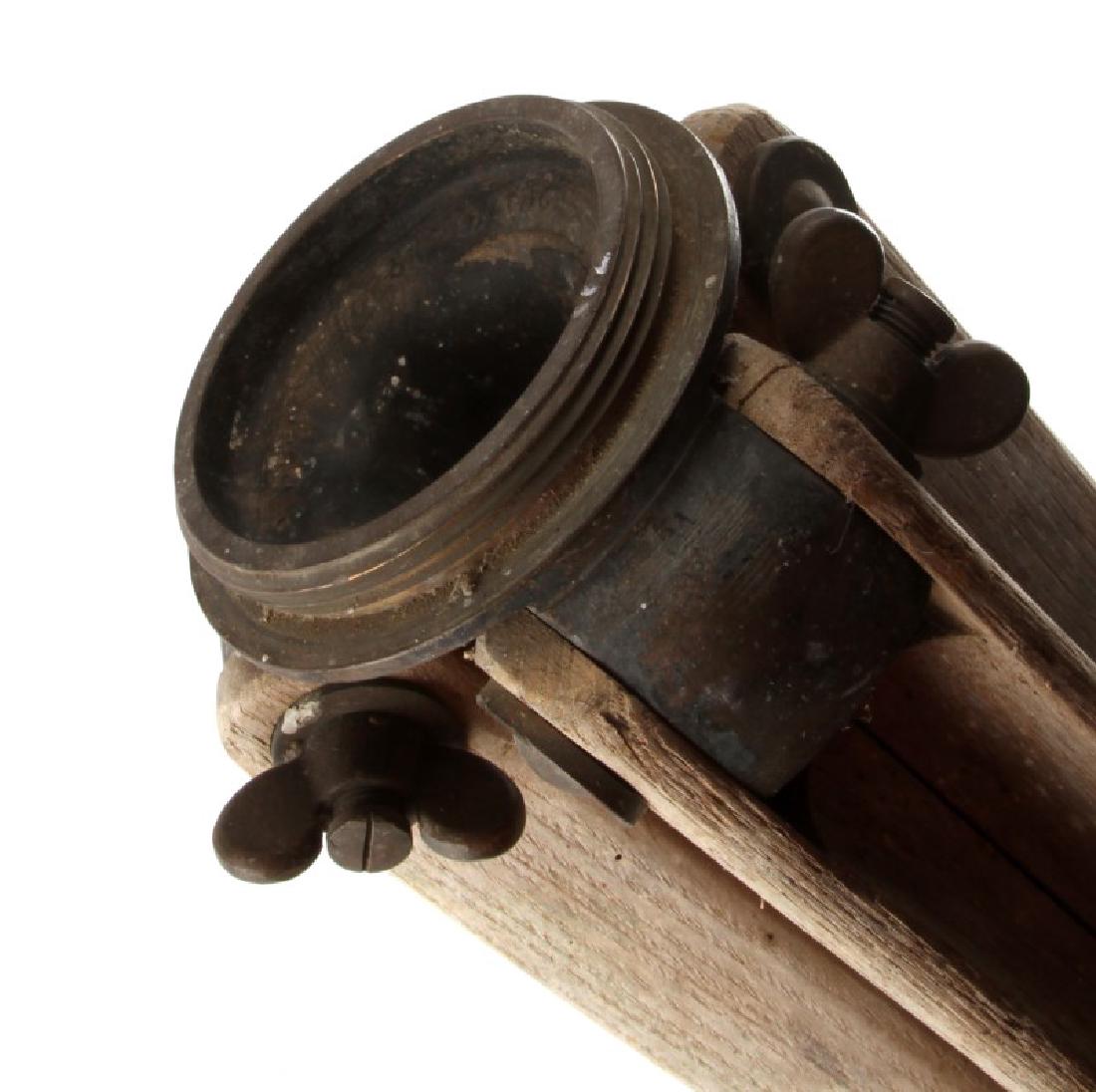 ANTIQUE WOODEN SURVEY TRIPOD 59 INCHES: Appears to be in good condition. General rusting and wear to metal feet. Weighs approximately 14 lbs. Please acquire third party shipping estimate prior to bidding.