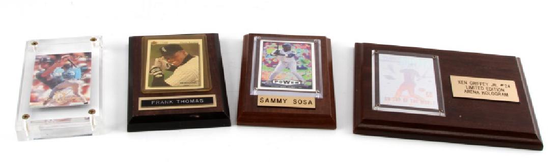 4 RARE BASEBALL TRADING CARDS ON PLAQUES: 4 rare baseball trading cards on plaques. Includes Ken Griffey Jr Limited Edition Arena Hologram, '94 Flair Alex Rodriguez, Sammy Sosa Victory Power Trip, and a '92 Upper Deck Frank Thomas.