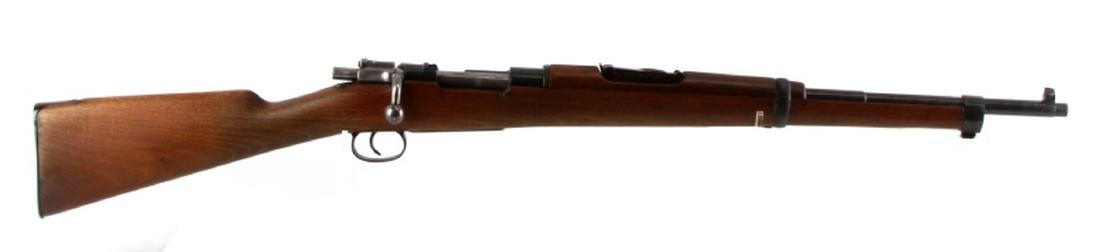 SPANISH MAUSER 93 7MM BOLT ACTION RIFLE: One Spanish Mauser rifle. Item is a bolt action rifle, chambered for 7mm. Item has a fair stock, has some nicks but overall good. Finish is good for age. Bolt is in good condition, but can be a little