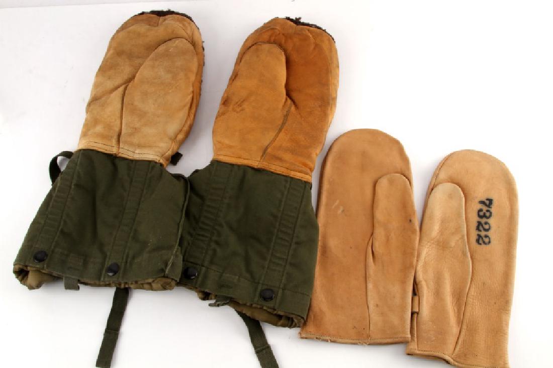 LOT OF 2 PAIRS VINTAGE US AIR FORCE GLOVES: Includes a pair of extreme cold weather gloves, sheepskin and wool (16" long by 6" wide). Second pair of leather gloves with metal buckles, one marked 7322 and the other 3392 (11" long by 5" wide). In