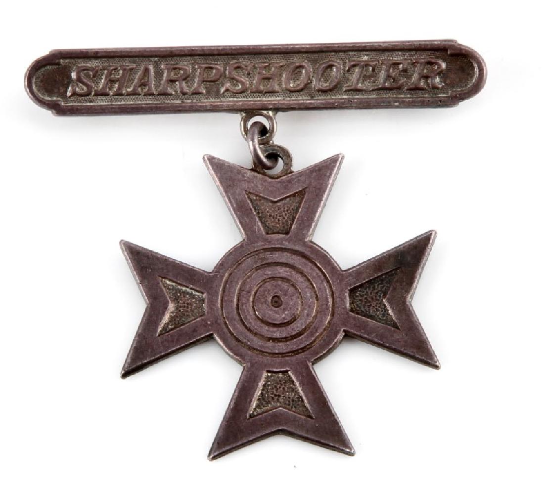 USMC OBSOLETE SHARPSHOOTER BADGE STERLING SILVER: USMC Obsolete Sharpshooter badge. Constructed of sterling silver. Light oxidation but very strong.