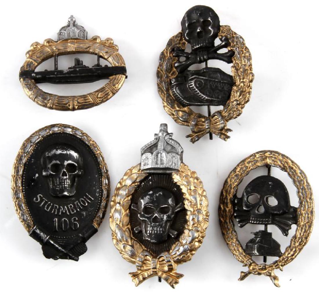 LOT 5 GERMAN WWII MILITARY BADGES PANZER STURMBAON: Lot of five (5) includes: Sturmbaon 106, naval, tank assault, and more. Age wear/paint loss/discoloring to badges. Makers marks on back. Badges measure approx. 1 3/4"-2 3/4". Unauthenticated. Sold "as