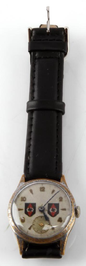 WWII GERMAN THIRD REICH HITLERJUGEND YOUTH WATCH: WWII German Third Reich period Hitlerjugend wrist watch. The watch is original, but strap has been replaced with a new leather one. Two diamond Swastika images on watch face. Some age wear, but in goo