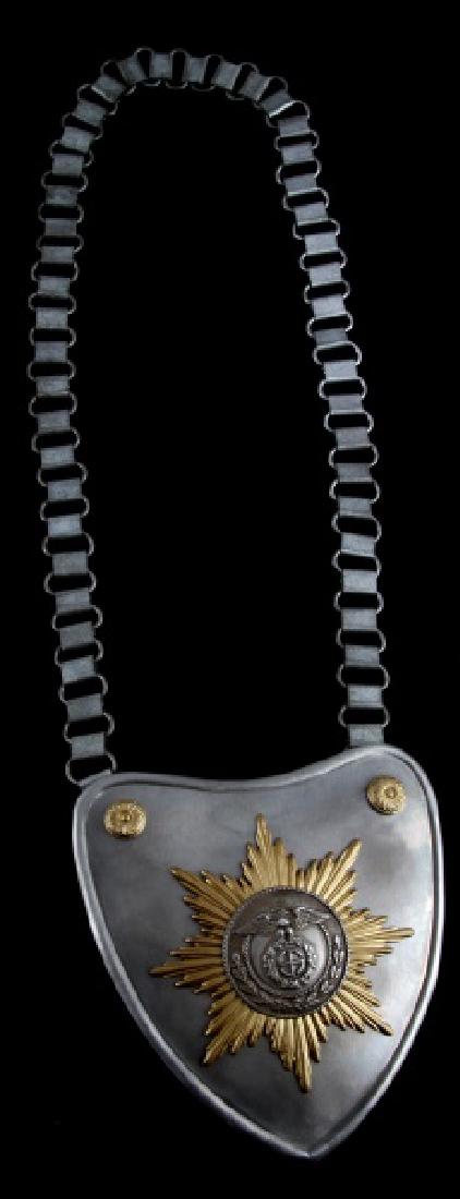 WWII GERMAN 3RD REICH FLAG BEARER GORGET W CHAIN: German Third Reich period S.A. flag bearer gorget with chain. Maker's mark - "R.Z.M. M34/2". Tin (?) construction with adornments. Piece is 4 3/4" x 4 3/4", total length is 18" with chain. Unauthentic