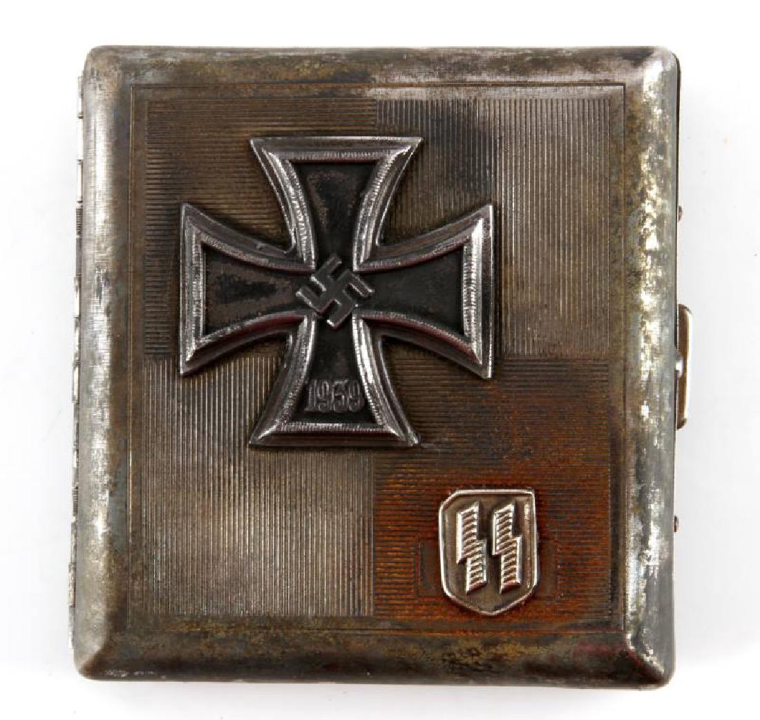 WWII GERMAN 3RD REICH SS IRON CROSS CIGARETTE CASE: WWII German Third Reich period Waffen SS Iron Cross winner's cigarette case. Front design: top left has large Iron Cross with Swastika and 1939 in it and double runes on bottom left. Inside makers mar