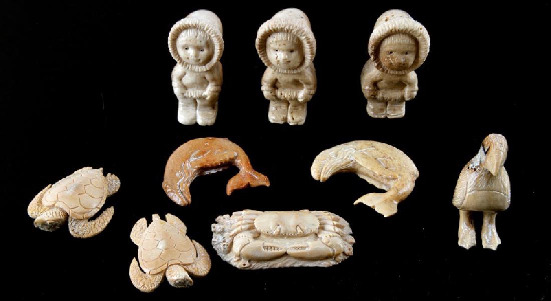 NATIVE AMER ALASKAN CARVED FOSSIL BONE FIGURES LOT: Nine pieces of Alaskan hand-carved fossil bone figurines: three Eskimo children, two turtles, two whales, one Puffin, and one crab. Various colors, fine detail, very good condition. All measure around