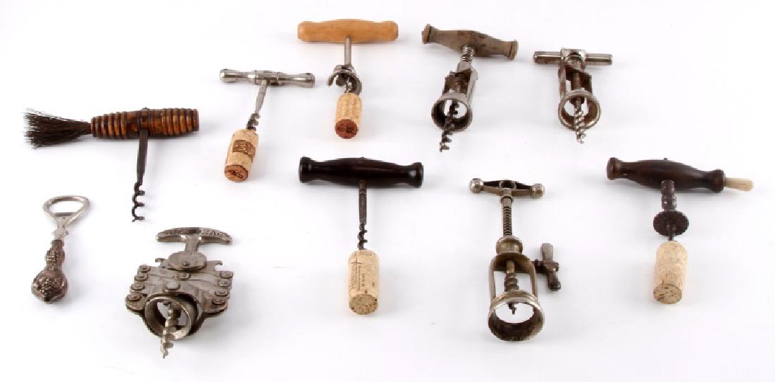9 ANTIQUE CORKSCREWS & 1 BOTTLE OPENER: All pieces are 19th and 20th century and a great variety.
