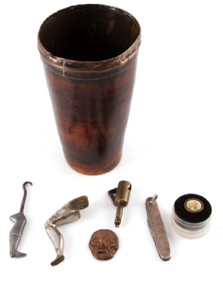 ANTIQUE LOT HORN CUP CHEROOT CUTTER GAL LEG HOOK: Includes early 17th century horn and copper cup, the interior is copper outer is horn and has a area of damage, Imperial silver 2 blade knife, driftwood folk art carved face, gal lady leg bottle opene