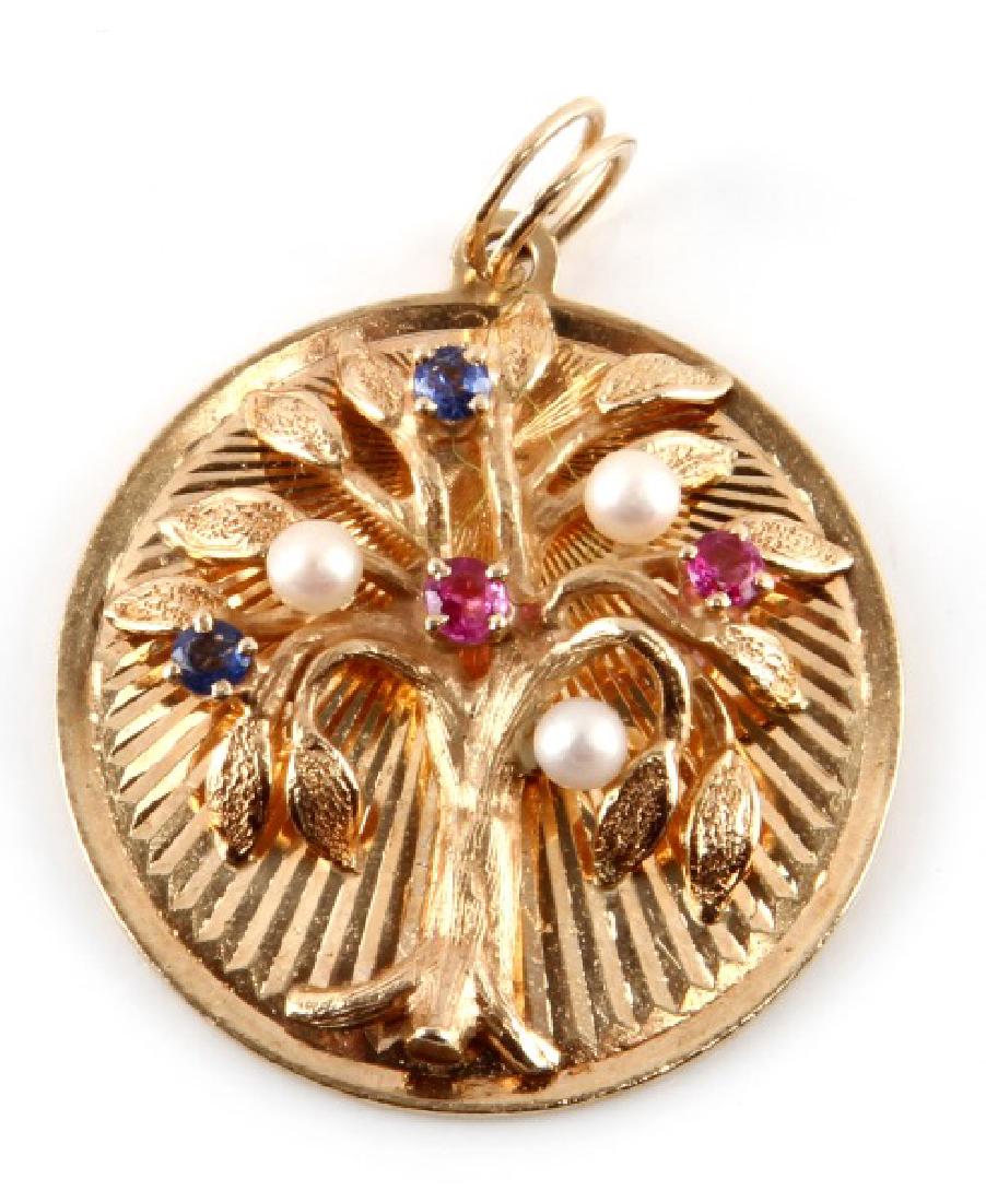 LADIES 14K YG VINTAGE PENDANT DANKNER 1962 TREE: Decorated with gemstones and pearls. Back is marked "Dankner, copyright, 14k, 8-19-62". approximate weight of 7.7 grams. Light feather scratches present; overall in very good condition. This lot has a