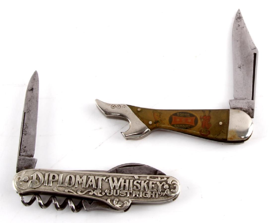 2 ANTIQUE ADVERTISING KNIFE BROWN SHOES & WHISKEY: Includes Buster Brown shoes lady leg knife by bridge cutlery 3.5 inches closed very good condition and Diplomat Whiskey by A. Kastor Bros. 3 blades and a corkscrew one being cigar cutter, 3.25 closed.
