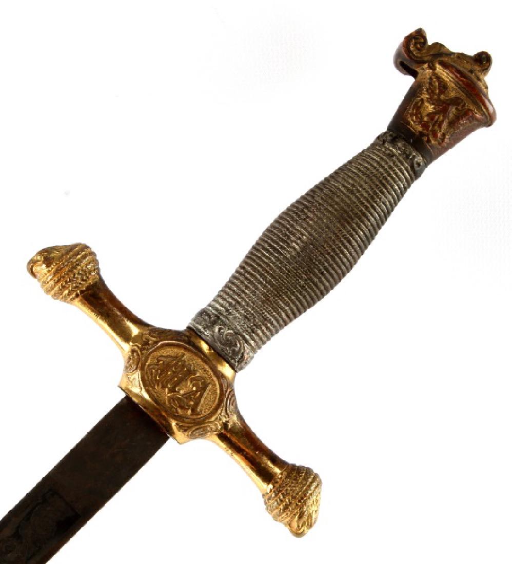 19TH CENTURY WEST POINT CADETS DRESS SWORD: Marked at base of blade, "RIDEAROCK P Co. NEW YORK N.Y." Beautiful scrollwork throughout blade, with an eagle on one side, and U.S. on the other. Blade has some scattered spotting and measures 30". En