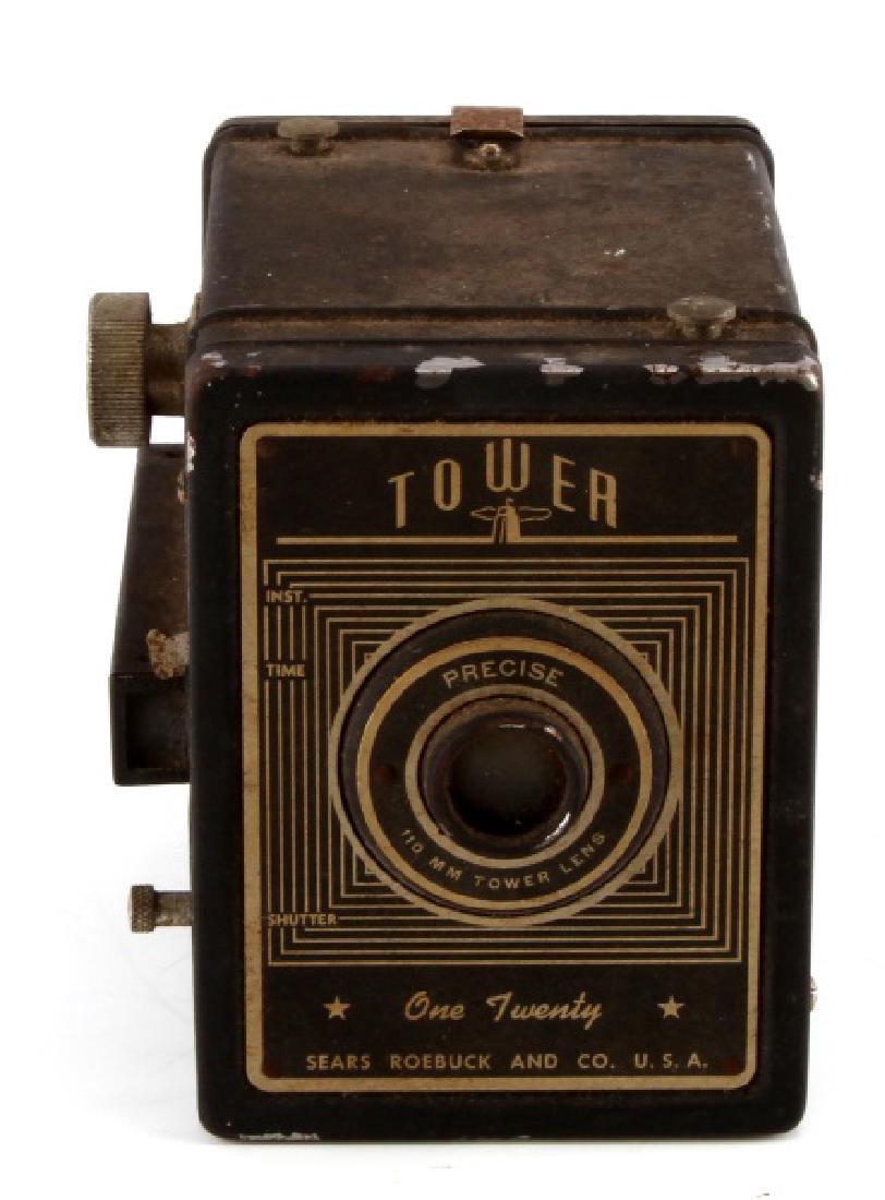 VINTAGE SEARS ROEBUCK TOWER CAMERA ONE TWENTY FLAS: Vintage Sears Roebuck and Co. camera. One twenty flash model. Features 110mm tower lens. In good condition. Measures 4 1/4 x 4 x 3".