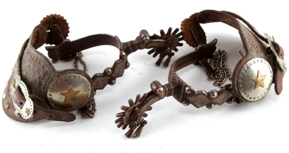 ANTIQUE E GARCIA STERLING INLAY COWBOY SPURS: 14 Spoke rowel with jingles, signed EGARCIA inside left, 3 inch heel entry,leather with nickel silver adornments, very good original condition.