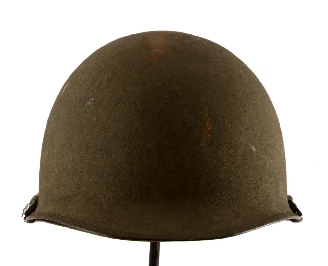 WWII US ARMY SWIVEL BALE M1 HELMET W LINER & STRAP: WWII-era U.S. Army military issued M1 helmet with swivel bale, outer shell, chin strap, inner shell, and burlap liner. Inside of outer shell is marked with "JU 3224" and "H-26". Some age wear, scuffs,