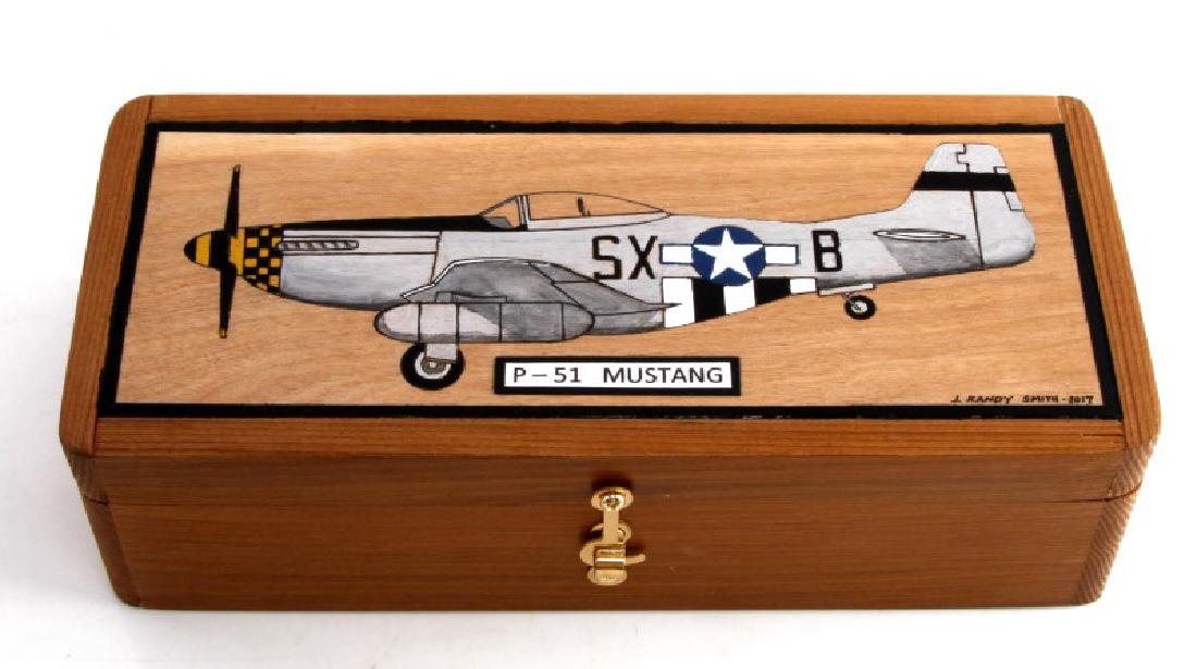 WWII AVIATION THEME P-51 MUSTANG TREASURE BOX: WWII themed treasure box made by the artist J. Randy Smith. Constructed of birch and cedar which was hand milled by the artist. Exterior shows hand painted P-51 Mustang. Interior complemented by a bla