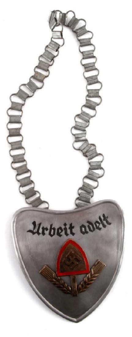 GERMAN WWII THIRD REICH RAD GORGET WITH CHAIN: German WWII Third Reich period RAD (Labor Front) flag bearer's gorget with chain. Some scratches and wear. Has maker's markings on reverse. Measures approx. 5" x 4.75". Unauthenticated. Sold "as is".