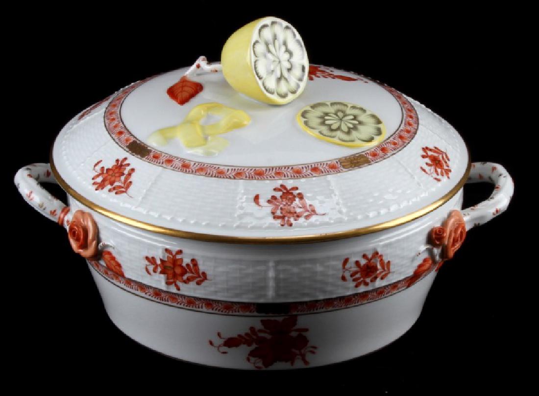HEREND CHINESE BOUQUET RUST COVERED TUREEN 42 AOG: Hand-painted Herend porcelain round covered tureen with handles and lemon finial lid. 24KT gold accents with floral bouquet over white. Few flowers in relief. Maker marked to bottom. Measures 10 X 8.5