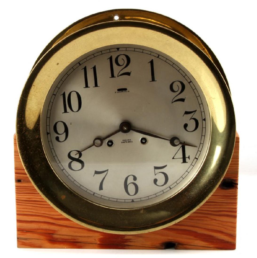 CHELSEA SHIP'S CLOCK BELL BRASS NAUTICAL CLOCK: One Chelsea Ship's Bell clock. Nautical style brass clock runs well, but it should be serviced, has key. Other than that, clock looks very good except for some light rusting, but it is not very obviou