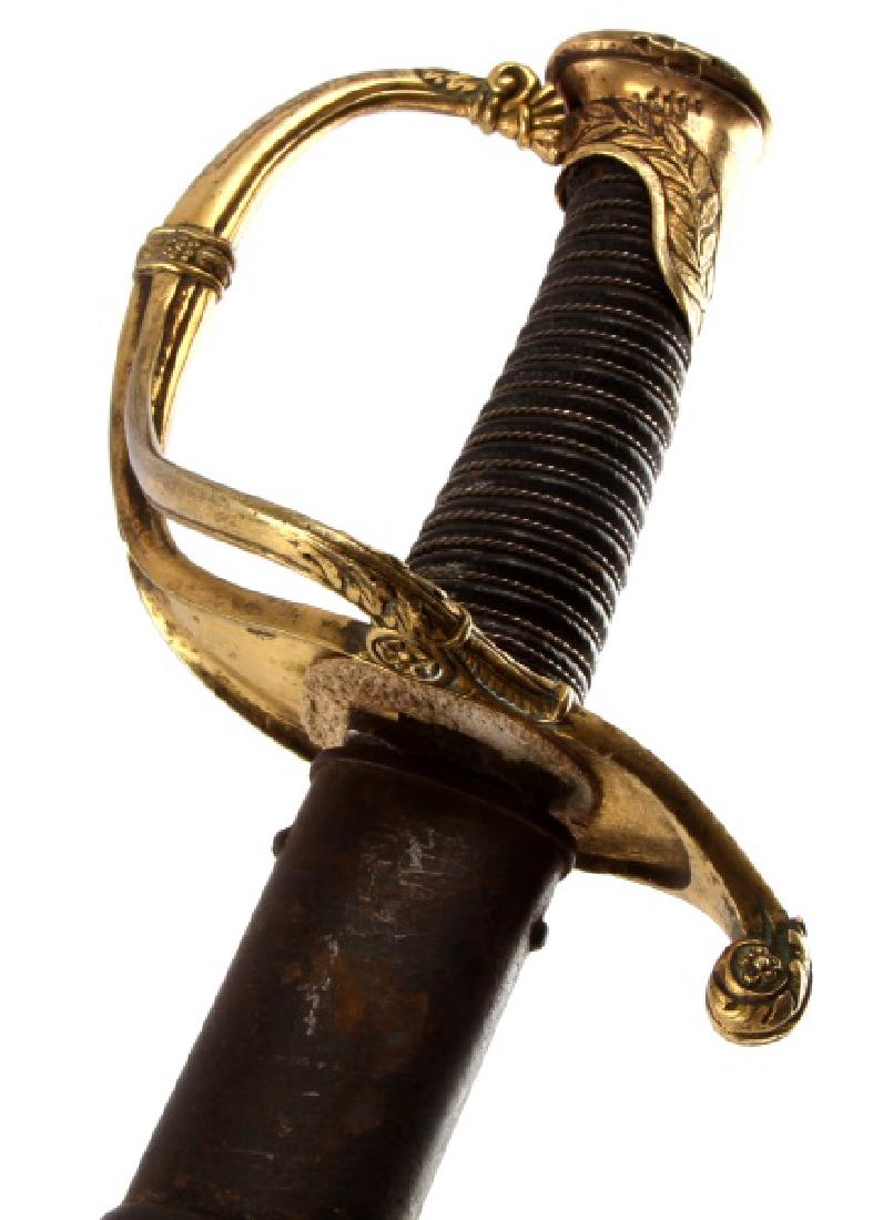 US MODEL 1860 CAVALRY DRAGOON SABER: Unmarked blade. With a wire wrapped handle. Measures approximately 33 1/2" overall with a blade that measures 28". In very good condition, with tarnish throughout blade.