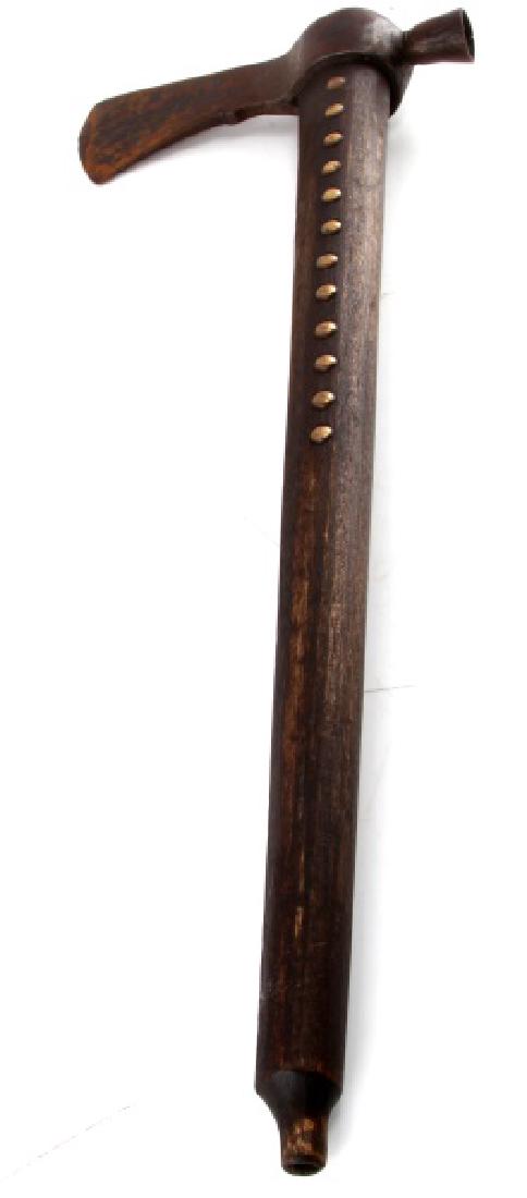 ANTIQUE NATIVE AMERICAN PIPE TOMAHAWK: Measures 20" long, with a blade measures 7". In very good condition with some rusting to blade, consistent with age. Pipe fitted with decorative brass tacks throughout.