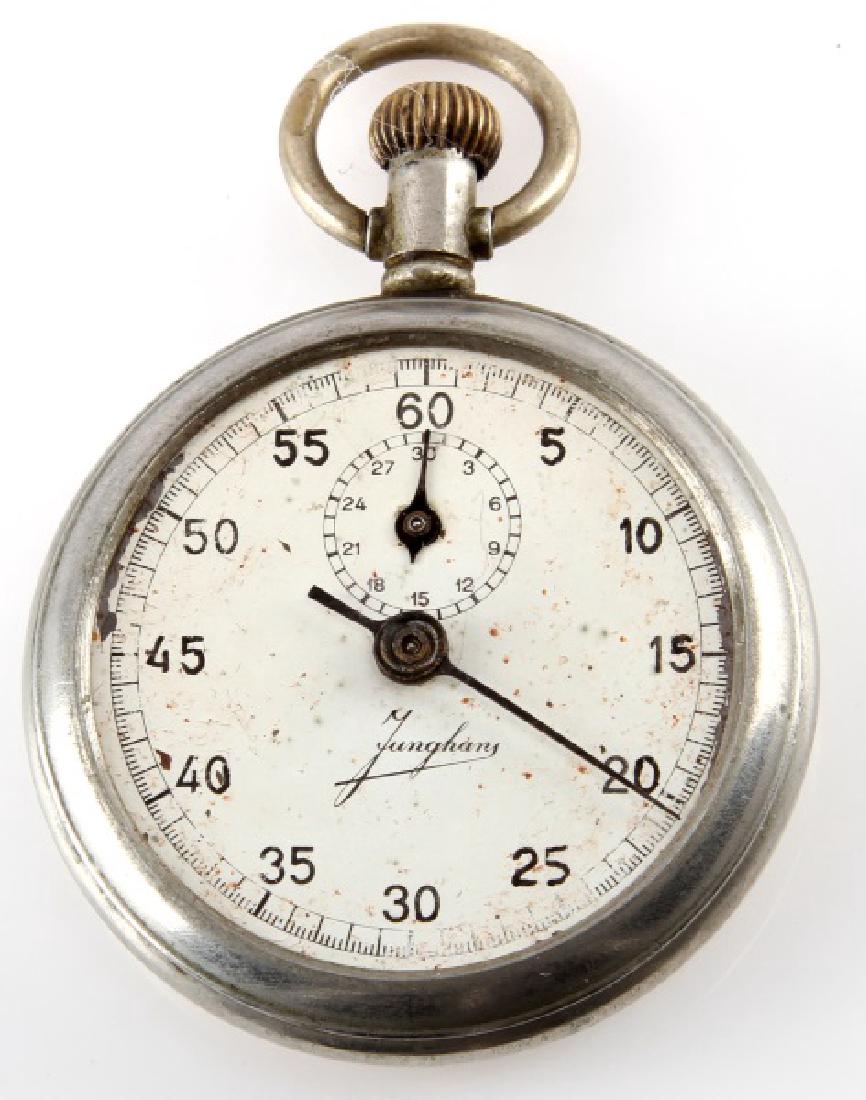WWII NSDAP 3RD REICH ENGRAVED WAFFEN SS STOPWATCH: German manufactured watch made by "Junghans" the famous German Watch company. According to the consignor the watch belonged to a man who attended the elite SS Fuhrer School at Wewelsburg Castle. Obver