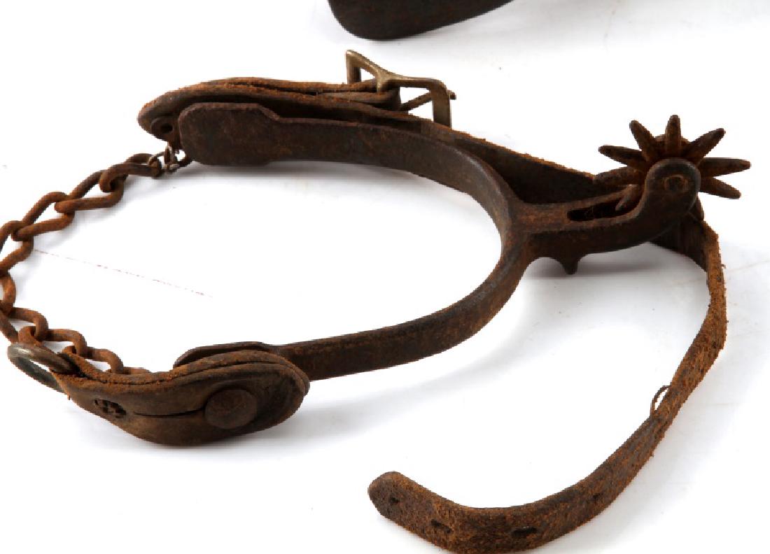 LOT 3 PAIR ANTIQUE IRON COWBOY SPURS SILVER INLAY: Lot of three (3) pair of antique iron cowboy spurs. 1) 4" rowels with silver inlay Mexican figure 8 shank spurs from Chihuahua, 2) 1 5/8" rowels with leather straps, 3)