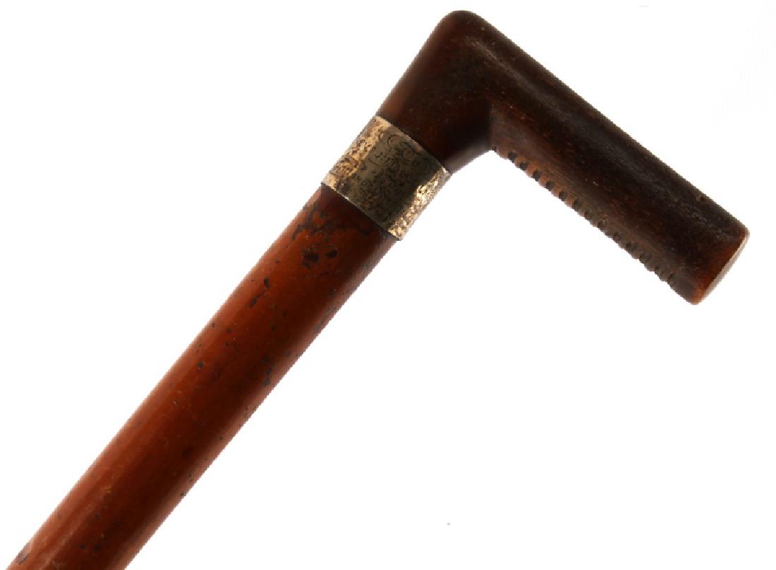 ANTIQUE WOODEN PRESENTATION WALKING STICK CANE: Antique Wooden hand carved & crafted presentation cane / Walking Stick with a silver locket separating handle from shaft which reads "To Rev. J. Malcomson From John & Marion Hill" engraved in relief o