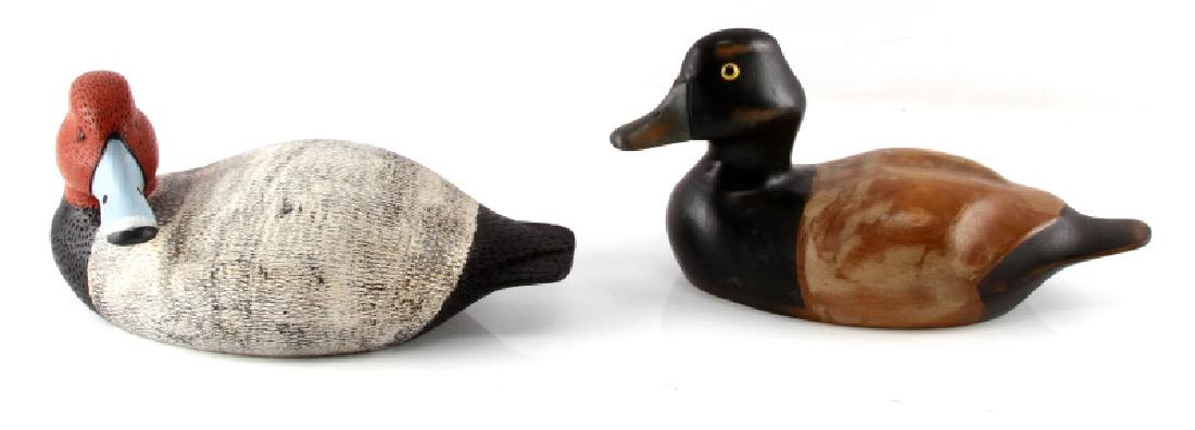 LOT OF TWO VINTAGE DUCK DECOYS H & RON FISHER: One measures approximately 12 1/2", and marked on the bottom, "91 H. FISHER" (carved). The second measures 12" long, and is marked, "RON FISHER CUSTOM WOOD CARVING" and is pencil signed and dated '80.