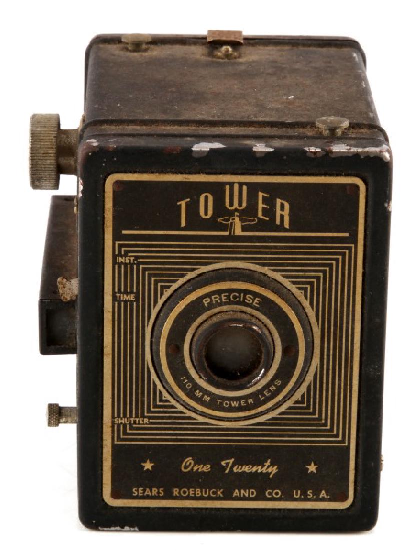 VINTAGE SEARS ROEBUCK TOWER CAMERA ONE TWENTY FLAS: Vintage Sears Roebuck and Co. camera. One twenty flash model. Features 110mm tower lens. In good condition. Measures 4 1/4 x 4 x 3".