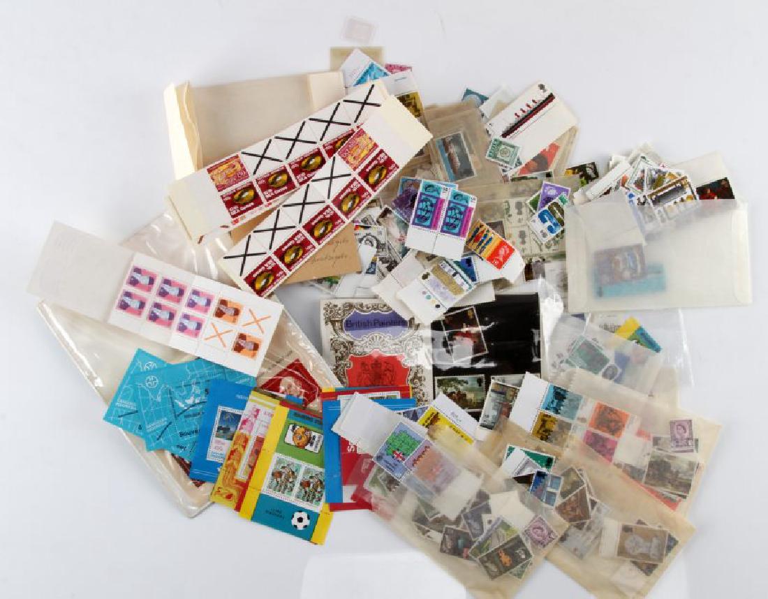WORLD UNUSED POSTAGE STAMP LOT BRITAIN CANADA: The vast majority of these stamps are British, but also Indonesia, a few German, Australia, Canada and a few other countries, they are as they came to us in envelopes mostly loose, but they are all un