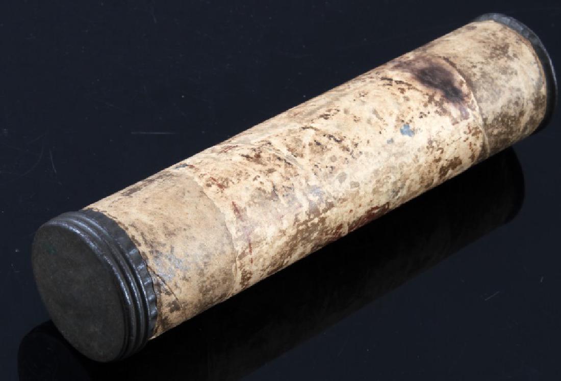 ANTIQUE MAXIM SILENCER TUBE & INSTRUCTION BOOKLET: Antique 6 1/2" Maxim Silencer tube with original rolled instruction booklet inside. A few markings can still be seen, but heavy wear to outside of tube. Instruction booklet very brittle and worn.