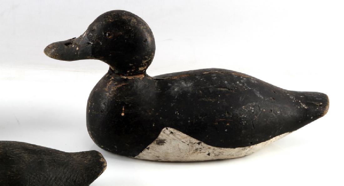THREE VINTAGE ANTIQUE WOODEN BLACK DUCK DECOYS