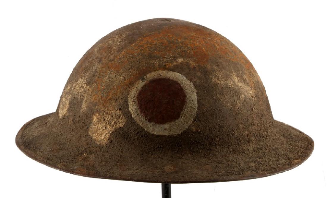 US WWI 37TH BUCKEYE DIVISION DOUGHBOY HELMET: U.S. WWI doughboy/brodie steel pot helmet. Features original felt interior. In fair condition. Strong oxidation on exterior and interior. Has painted red and white circle design on front for the 37th 