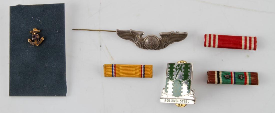 US WWII PILOTS WINGS STERLING SILVER MEDALS PINS: WWII USAF pilots wings in sterling silver. Also included in this lot is medal insignia pin, 20 years of service pin, and 3 ribbons (European African & Middle Eastern, Good Conduct, American Defense).