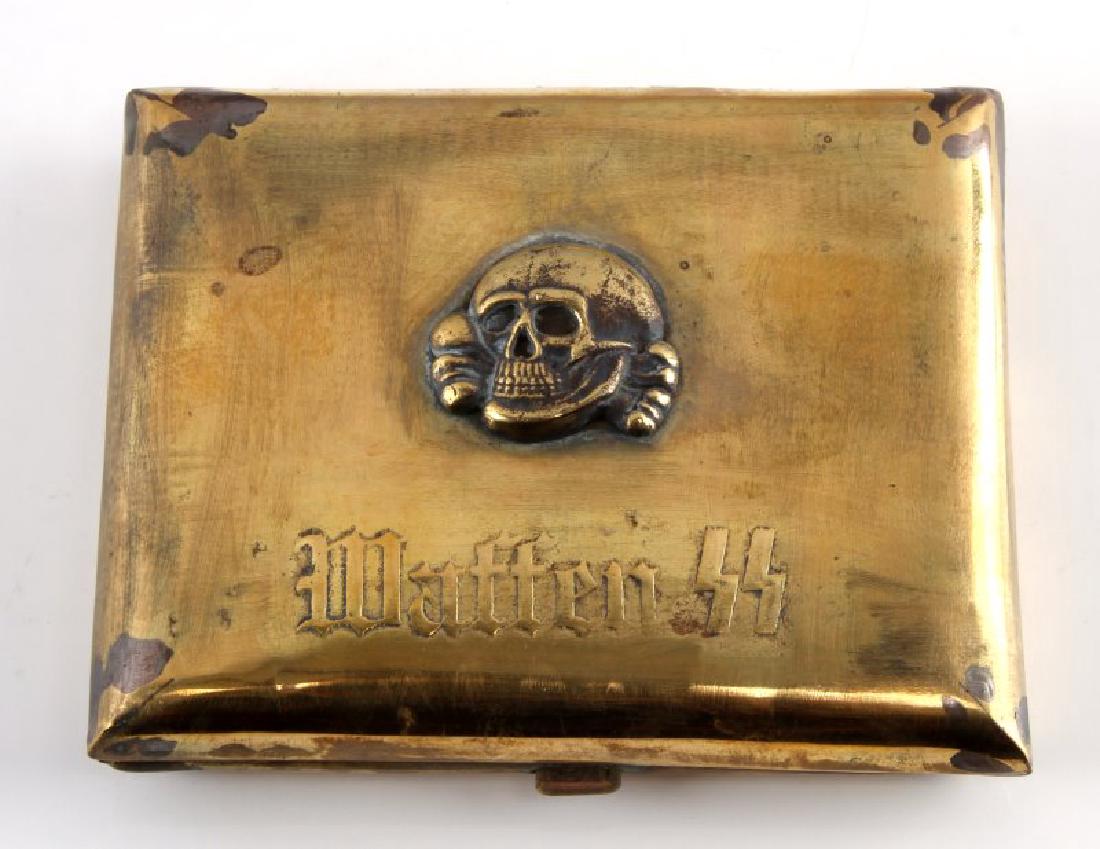 WWII THIRD REICH WAFFEN SS PANSER CIGARETTE CASE: Waffen SS panzer division Totenkopf cigarette case. In good condition with general wear and patina. Unauthenticated, sold as is. This lot has a reserve.