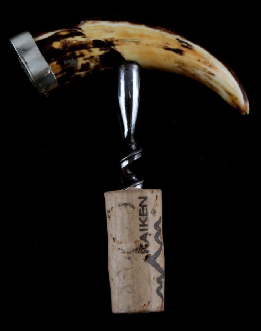 HERMANN GORING GOERING CREST BOAR TUSK CORKSCREW: On .800 stamped silver is the Goring family crest, nicely patinated tusk handle, measures along the handle 4.25 inches.