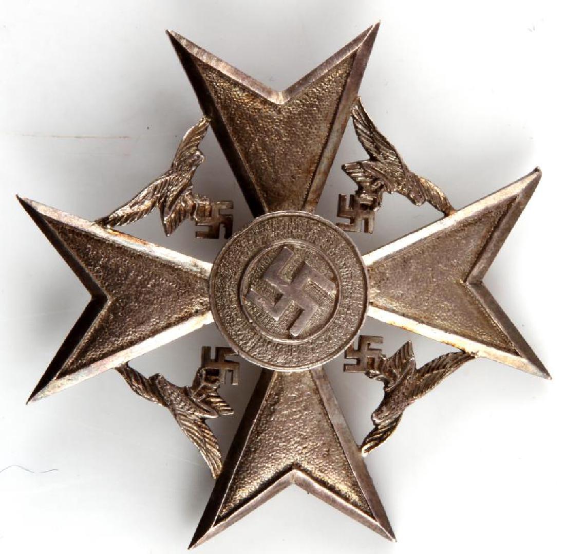GERMAN WWII SPANISH CROSS IN SILVER W OUT SWORDS: Silver medal, 2 1/4" square, consisting of a Maltese cross with a swastika in the center, with four Luftwaffe eagles between the arms and a clasp back. It is marked on the reverse "CEJ" for maker. Thi