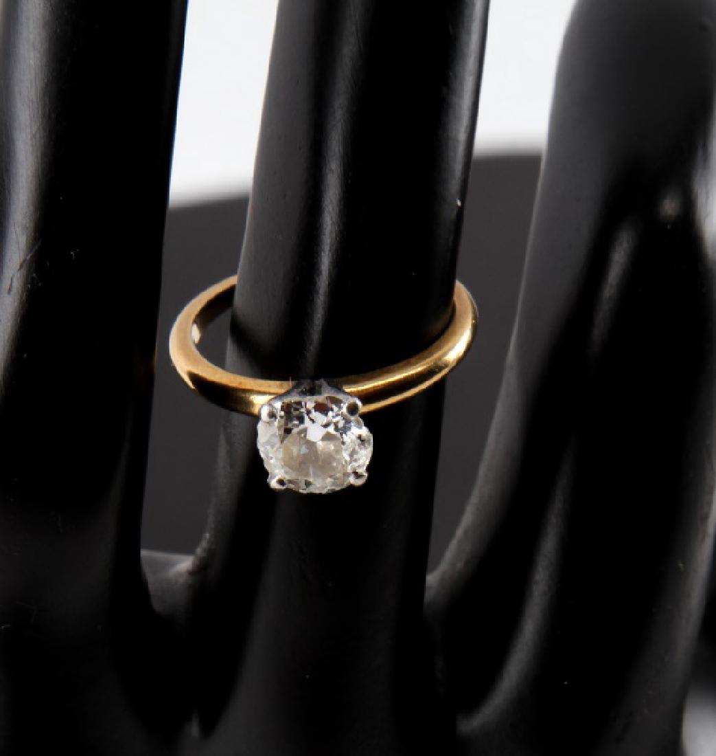 SOLITAIRE RD DIAMOND 18KT GOLD PLATINUM RING 1.25: Round diamond stone measures 7mm across (1.25 TCW) with J-K color and SI2 clarity. Inside band marked "18K-PLAT ©J Abel". Stone is chipped at all sides. Cloudy color to center. Needs professional cle
