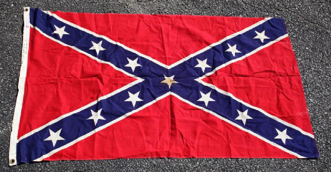VINTAGE CONFEDERATE STARS AND BARS FLAG: Good coloration, 36" x 60", some wear to hoist of flag, 3" stain on center star.