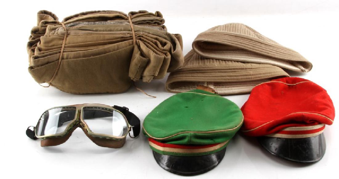 LOT OF RUSSIAN INDIAN MILITARY HEADGEAR: Variety lot to include 20 Soviet overseas type caps a few with insignia, 2 WWL Imperial Russian visors ( Heavily mothed), Indian turban hats, Russian Pilot goggles post war,