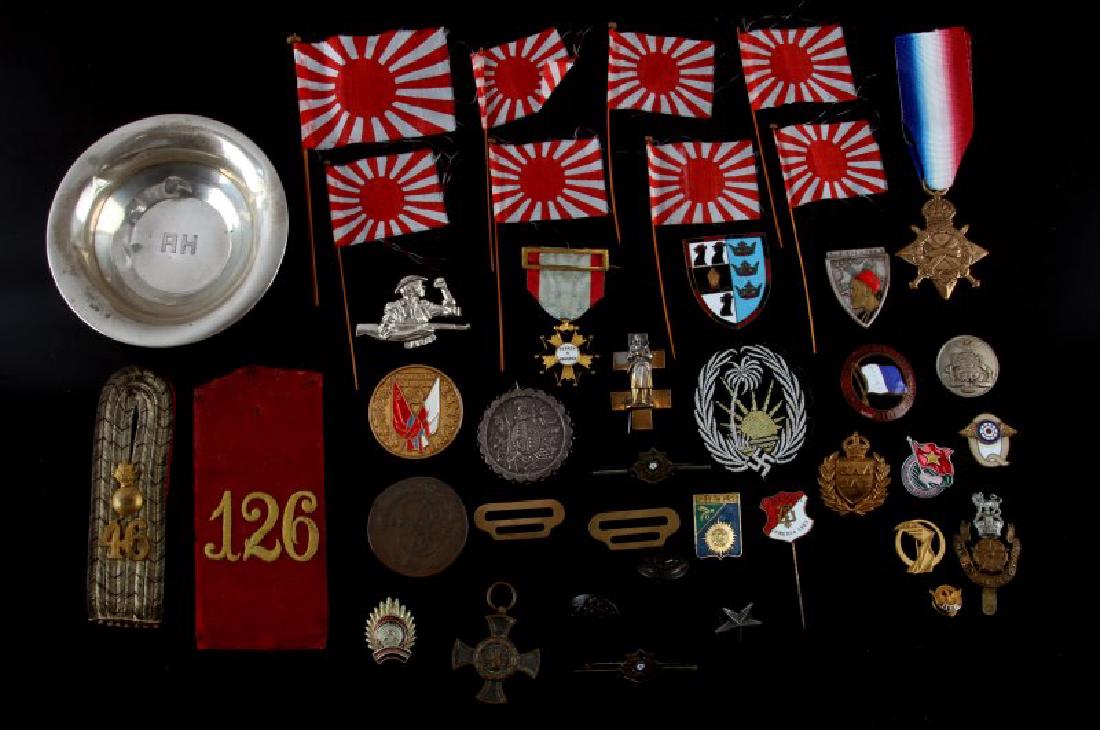 ASSORTED LOT OF EARLY 20TH CENTURY MILITARY ITEMS: Grouping of vintage to antique military items from the early 20th century period including : shoulder boards, medals, pins patches a hallmarked silver ashtray marked "AH" in center, Afrika Korps palm 
