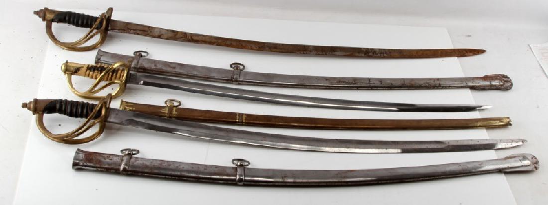 LOT OF 3 1840 CAVALRY DRAGOON SABERS REPRO: Each measures approximately 40" overall, with blades that measure 35". All with sheaths. Two marked India at base of blade, one marked CSA. Very fine reproductions. Some wear to blade and sheaths. "CS