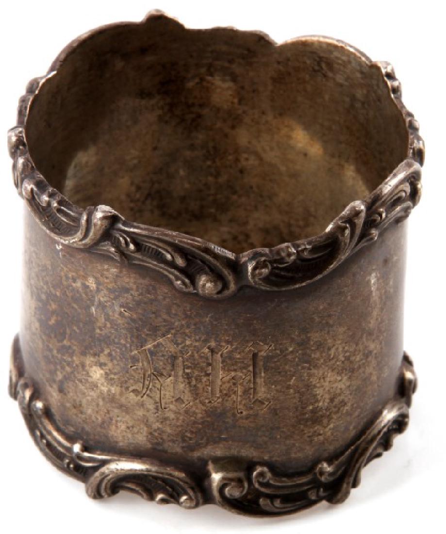 ADOLF HITLER SILVER NAPKIN RING GERMAN WWII: Adolf Hitler silver napkin ring made in Germany during WWII. An informal dinner pattern. Features AH on exterior. Measures 1 5/8" in diameter. Fine detail and good condition. Unauthenticated, sold as