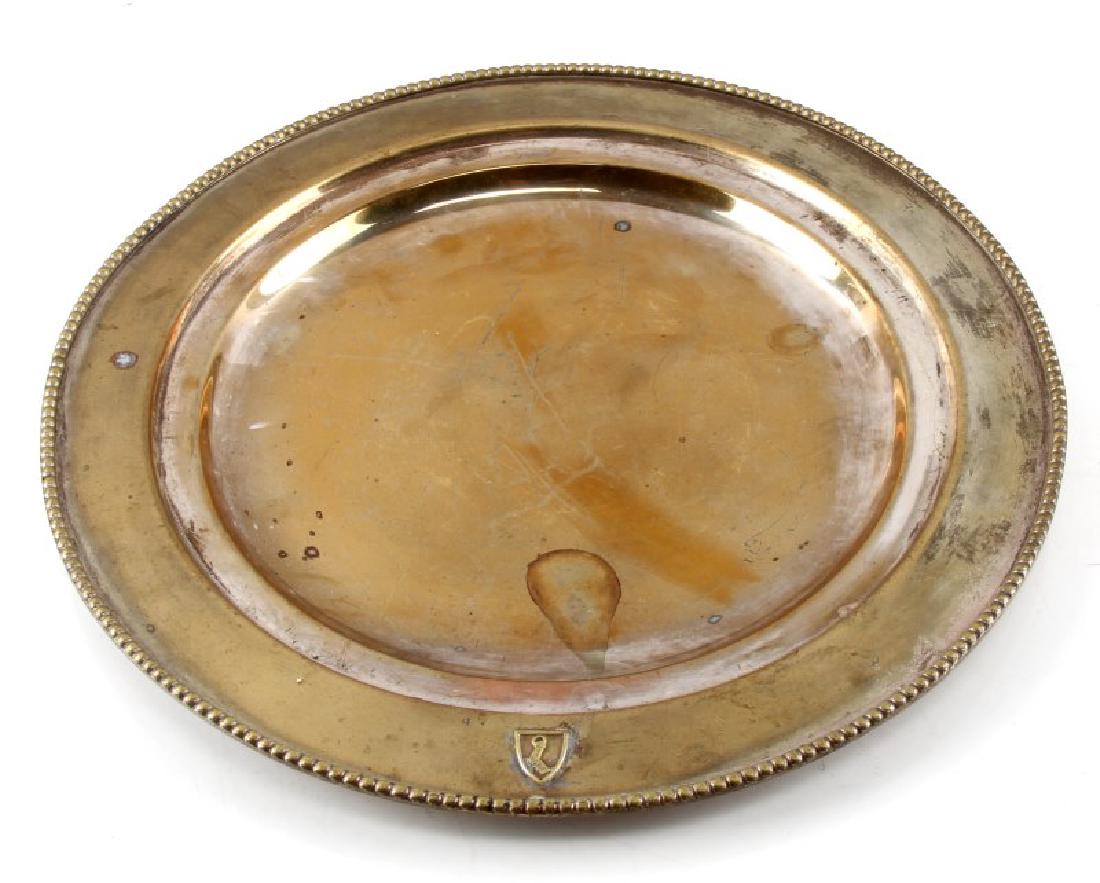 HERMANN GOERING LARGE PERSONAL SILVER PLATE WWII: German WWII Hermann Goering large personal silver plated dinner plate. Features his personal shield on outside rim. Measures 13 1/4" in diameter. Minimal tarnishing. VG condition.