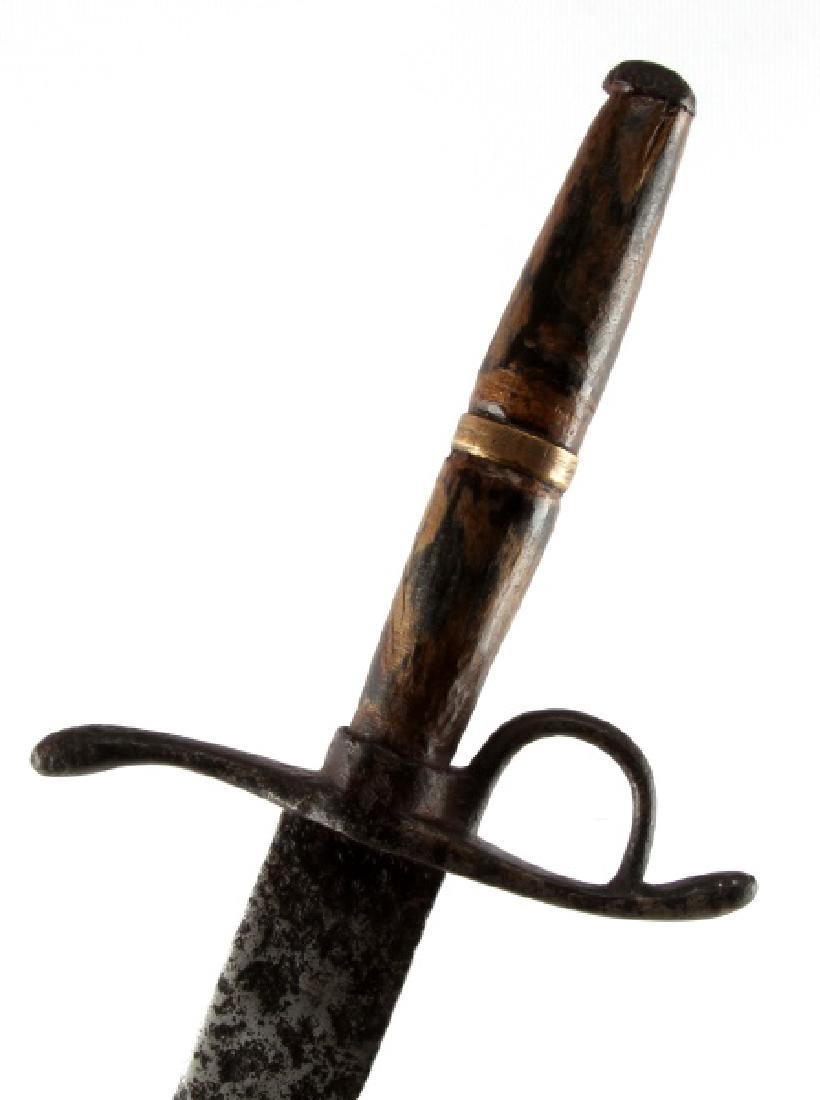 LEFT HAND S QUILLON PARRYING DAGGER WITH RING: S-quilloned parrying dagger with a a finger ring just below the crossguard. Used in conjunction with a rapier or some other long fighting sword in duels. Measures 24 inches long overall, with the blad