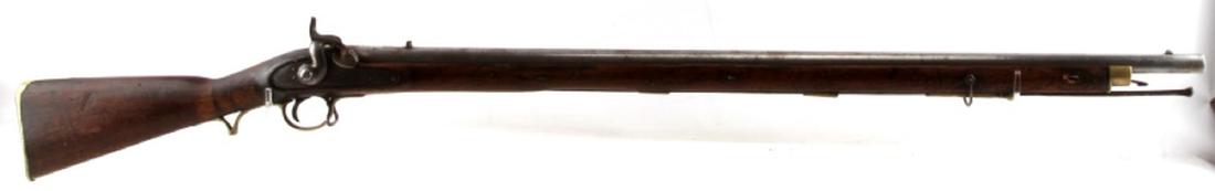 BRITISH EAST INDIA COMP MOD F PERCUSSION MUSKET 75: .75 caliber musket with lion holding crown marking on lock plate, 39 inch round barrel with crown over P mark and V below, full wood stock, brass bands, butt and trigger guard. Finish and wood in very