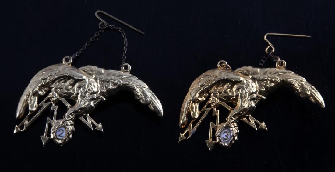 PAIR OF VTG POLISH MILITARY PILOT BADGES IN GOLD: Pair of vintage Polish Air Force & Naval pilot's badges in what appears to be a gold colored metal alloy. Lot includes one which is marked with an encircled "2" and another with an encircled "3" most 